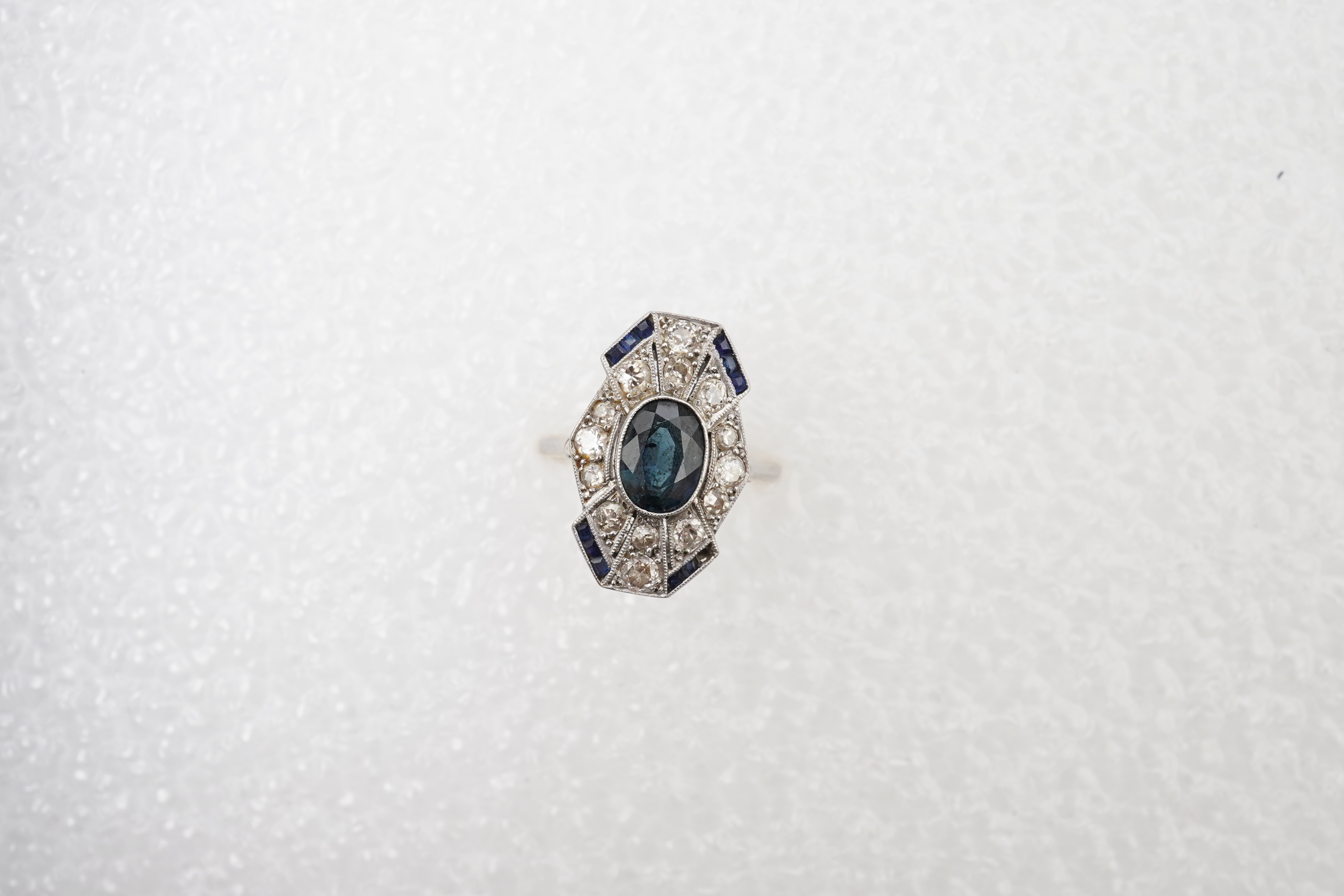 A sapphire and diamond ring